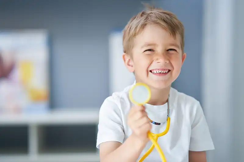 Little boy having fun at the doctor