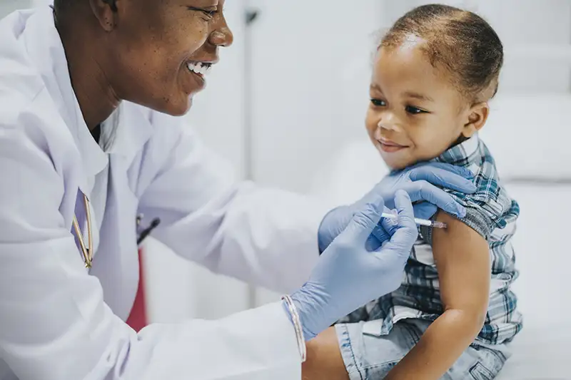 toddler-getting-a-vaccination-by-a-pediatrician